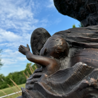 Child Reaches Out to Heaven